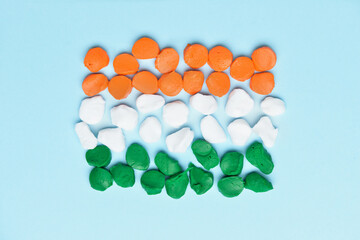Flag of India made of plasticine on color background