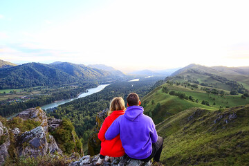 Fototapeta premium couple hugging in mountains landscape, romance happiness adventure together active