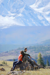 Fototapeta premium couple hugging in mountains landscape, romance happiness adventure together active