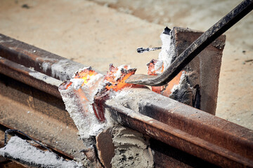 Railway track reconstruction on a public site.