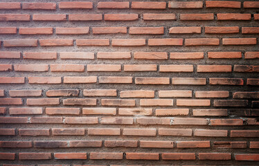 Red brick wall surface.