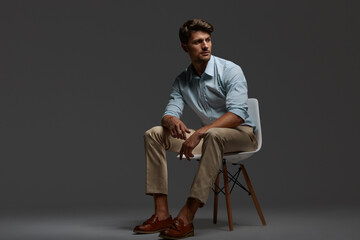 Focused european business man sitting on chair