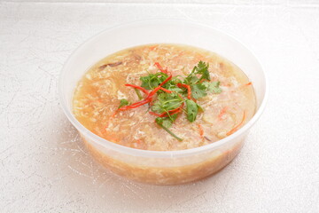 braised chinese fish maw thick shark's fin hot soup in party bento tray box for asian take away halal menu