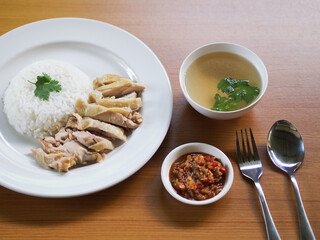 Hainanese chicken rice or steam chicken with rice asian food.