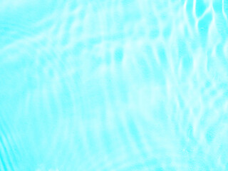 Ripple water texture on blue pool background. Shadow of water on sunlight. Mockup for product, spa or travel background. Marble blue water surface as wallpaper background