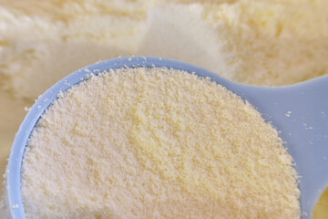 Formula for feeding a newborn baby as a substitute for milk, close-up macro photo