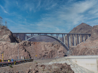 Medium wide shot of Mike O'Callaghan-Pat Tillman Memorial Bridge over Colorado River at Hoover Dam, Nevada.
