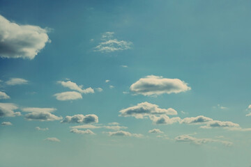 clouds on a vintage, blue sky background. abstract with blue sky and white clouds