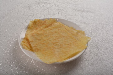 bake egg crepe skin for roasted bbq Peking duck wrapping in bento box for asian take away halal menu
