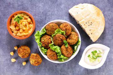 lebanese food selection- hummus,  pita bread and falafel