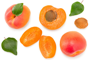apricot fruits with slices and green leaf isolated on white background. clipping path. top view