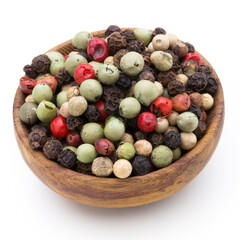 Pepper mix seed on spoon on white background.