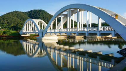 Beautiful ancient white railway bridge in Thailand.