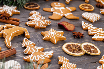 Homemade christmas gingerbread cookies on wooden table.
