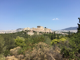 View of the Parthenon on the Athenian Acropolis seen from the Filopappou Hill, also called the Hill of the Muses, in Athens, Greece.