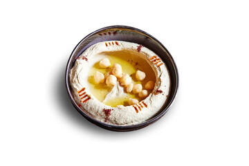 Black bowl with hoummous apetizer isolated on white