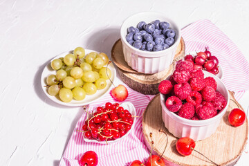 Fresh raspberries, blueberries, grape, sweet cherries, and red currants