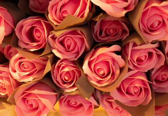 A large bouquet of multicolored roses in a soft and blurry style for the background