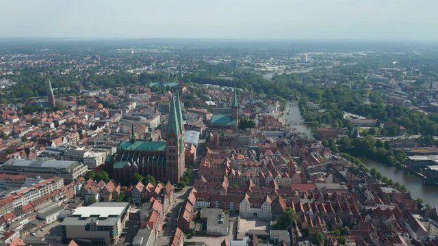 Aerial panoramic view of old town with red brick houses, churches and buildings. Luebeck, Schleswig-Holstein, Germany