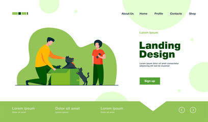 Dad and son adopting pets. Man opening box with dog, kid, cat flat vector illustration. Animals care, pet adoption concept for banner, website design or landing web page