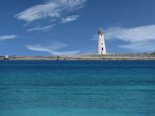 Nassau Harbour Lighthouse, a historical landmark in the Bahamas seen from Junkanoo Beach.
