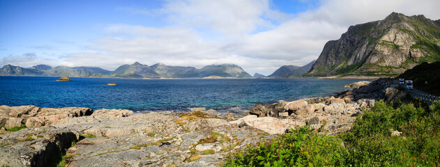 Wide panorama of the road and the mobile homes on the fjord coast Lofoten islands, Norway