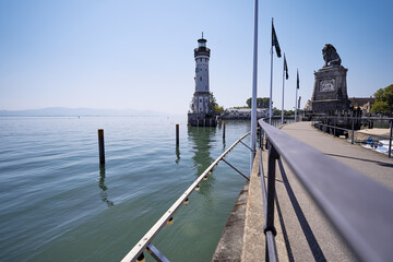 Fototapeta na wymiar The Lion and The Lighthouse - the entrance into Lindau's harbor.