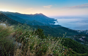 Panoramic landscape of Budva riviera in Montenegro. Morning light. Balkans, Adriatic sea, Europe. View from the top of the mountain.