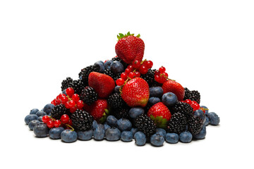 Blackberry, raspberry, blueberry,  red currant and mint background.