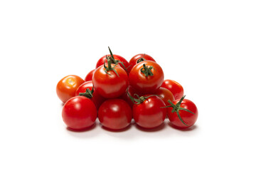 Many cherry tomatoes isolated on  white background. Group of cherry tomatoes.