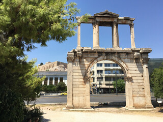 The Arch of Hadrian, most commonly known in Greek as Hadrian's Gate, is a monumental gateway in Athens, Greece. The Parthenon on the Athenian Acropolis can be seen in the background.