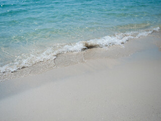 Sea wave on the beach,Beautiful blue ocean and beach copy space