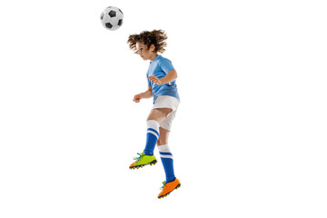 Fototapeta na wymiar Young sportsman, football soccer player, child playing football isolated on white studio background. Concept of sport, game, hobby