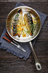 fried mackerel fillets with spices and herbs