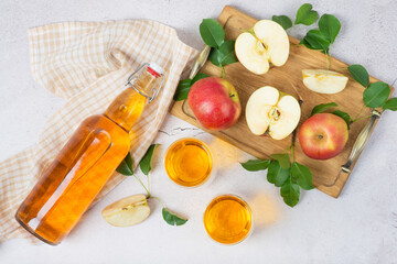 Fototapeta na wymiar apple cider vinegar on a brown table