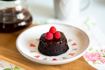chocolate fondant cake. Mini cake for fondant with icing. Delicious  dessert.Homemade chocolate lava cake.Fondant Lava Cupcake.Warm chocolate dessert.Chocolate cake.Cupcake with berries.Breakfast 