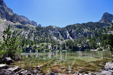 Main view of Escarpinosa lake, one of the most amazing spots of Estos valley in the Pyrenees Mountains, Spain.