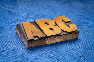 abc, a, b, c - first three letters of alphabet in vintage wooden letterpress type blocks against...