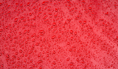 condensation after rain red surface with water drops background concept picture