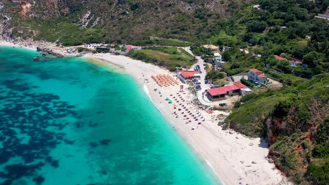 Aerial view to the popular beach of Petani on the island of Kefalonia, Greece, with turquoise sea and fine pebbles