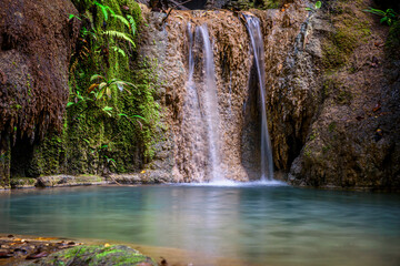 Fototapeta na wymiar Wang Tong Waterfall located in Buatong Waterfall and Chet Si Fountain National Park, Chiang Mai, Thailand.