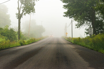Heavy Fog along Route 79 in Windsor in Broome County in Upstate NY.  The Susquehanna River causes...