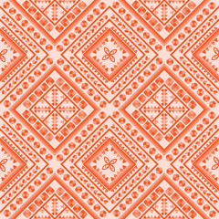 ethnics geometric orange flower seamless in orange background for fabric