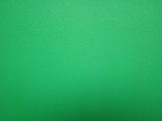 Smooth surface,  green  plaster wall