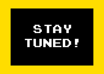 A message on a computer screen: stay tuned! 8-bit retro font, white text inside a black box, yellow background.
