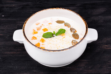 millet porridge, with pumpkin, milk, butter, pumpkin seeds