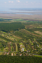 Obraz premium Aerial panoramic drone view of a beautiful Hungarian landscape on a moody summer morning.
