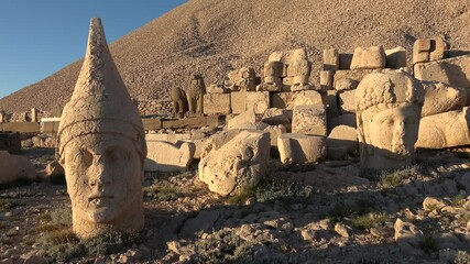 Mount Nemrut, Adiyaman, Turkey - 17th of June 2021: 4K God heads at set of sun
