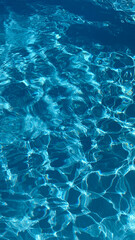 Blue water swimming pool texture, underwater pattern