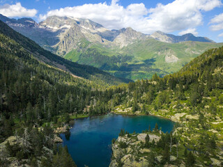 Fototapeta na wymiar Aerial view of a wild lake in the middle of the high mountains of pyrenees.